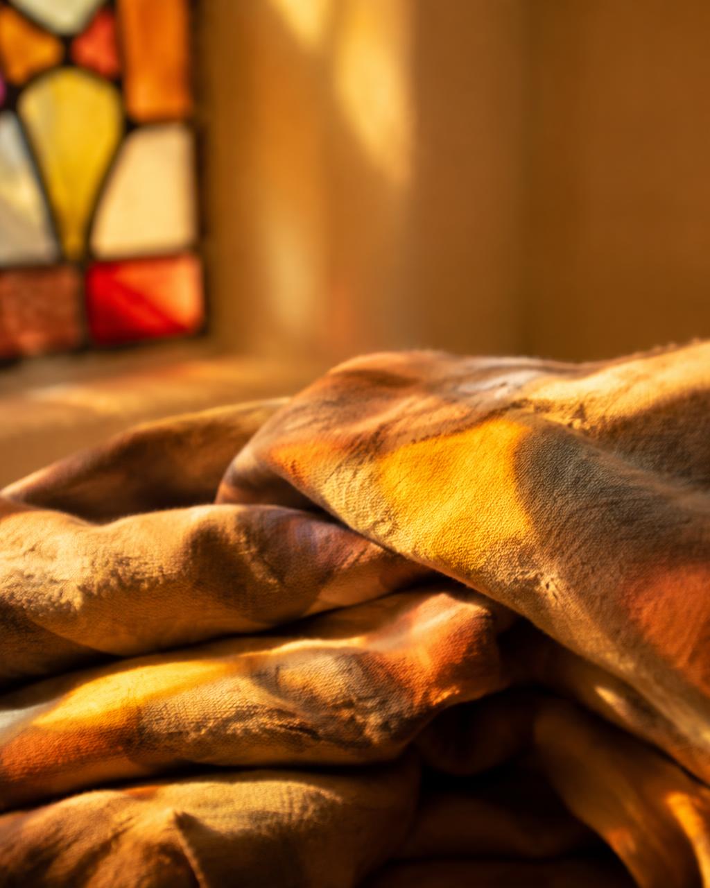 Folded cotton in warm morning light